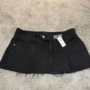 Garage mini black denim skirt